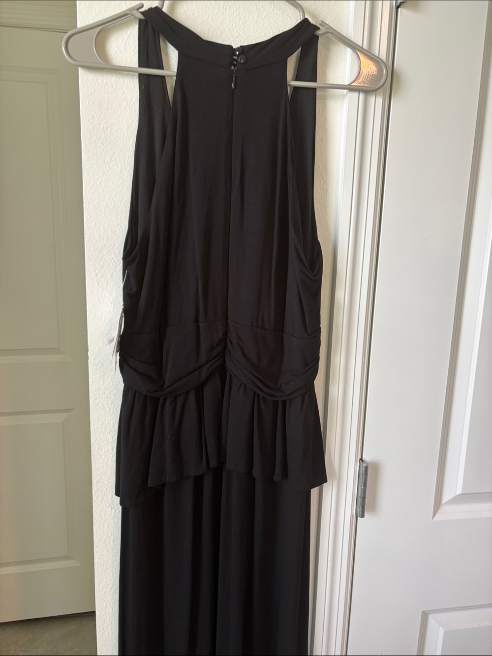 Sleek Black Sleeveless Maxi Dress with Peplum Detail - Picture 4 of 5